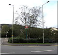 Tonypandy railway station name sign behind two lampposts