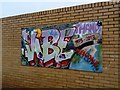 View of street art on the side of The Vibe Youth Centre on School Way