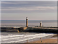NZ8911 : Piers and Lighthouses at Whitby Harbour by David Dixon