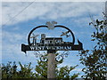 TL6149 : West Wickham village sign by Keith Edkins