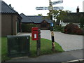 Elizabeth II postbox on The Street, Rockland St Mary