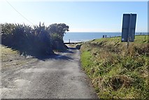 J2105 : Templetown Road approaching the sea front by Eric Jones