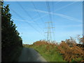 Power lines making a cats-cradle with vapour trails, near Waun Castellau