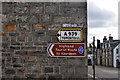 Old road sign in Grantown