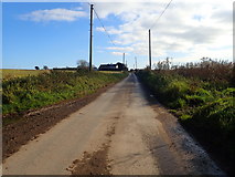 J2005 : View south-eastwards along a muddy section of Templetown Road by Eric Jones