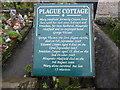 Information board at Plague Cottage, Eyam