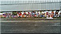 TQ3889 : View of street art on the rear of a building in the Ravenswood Industrial Estate by Robert Lamb