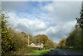 House and car, next to the A465, heading north