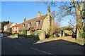 Bottisham High Street: cottages and bus stop