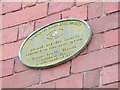 SJ3350 : Plaque on the old brewery chimney, Wrexham by Stephen Craven
