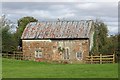 SJ3179 : Old farm building at Raby by Jeff Buck