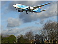 A plane landing over Myrtle Avenue