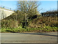 Sign and stile to footpath beside the M4, Miskin