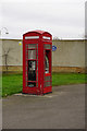 Telephone kiosk and cash machine