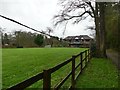 Fenced field beside a footpath