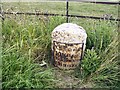 Old Milestone by the A595, north east of B5305 crossroads