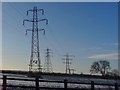 Snow and pylons on Etwall Common