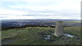 SJ9898 : Trig point on Wild Bank Hill & view over Stalybridge by Colin Park