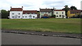 Houses on the east side of the village green, Iron Acton