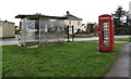 Bus shelter and red phonebox, Bath Road, Leonard Stanley