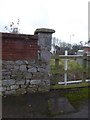 Wall and bench mark, footpath off Elm Grove Road