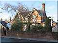 Darley Cottage and a Chester Cross milepost