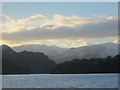 NY4522 : Snowy distant mountains from the steamer on Ullswater by Peter S