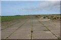 SM7925 : Looking west along the former runway of RAF St David's airfield by Simon Mortimer