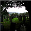 SJ9498 : View through the gravestones by Gerald England