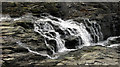 SX0382 : Waterfall near Jacket's Point by Derek Harper