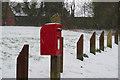 SE9833 : Postbox on Rowley Road, Little Weighton by Ian S