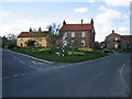 Whixley village green and a fingerpost