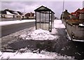 Snow at bus shelter