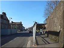 NS7993 : Old Town Wall beside Dumbarton Road by Lairich Rig