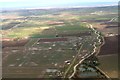 Long Eau swollen by rain, approaching Three Bridges: aerial 2018