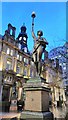 SE2933 : Bronze lamp bearer, Leeds City Square by Philip Halling