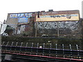 Old signs overlooking Whitechapel station