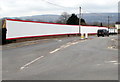 Long red and white fence, Woodland Road, Croesyceiliog, Cwmbran