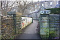 Footbridge over lifted railway, with Parkwood Street houses in background