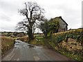 Dilapidated farm building on Northcote Hill