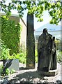 Statue of St Dogmael and obelisk