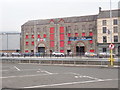 The rear of shopping units in the Corn Market shopping area