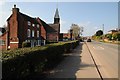 The A443 passing through Hallow