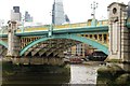 TQ3280 : An arch in Southwark Bridge by Steve Daniels