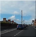 Cycle and pedestrian path next to car parking lane