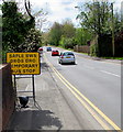 Yellow temporary bus stop sign, Cefn Road, Rogerstone