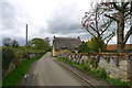 Pretty stone wall and cottage, Pilton