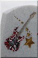 Guitar on a headstone