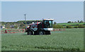 NZ2454 : Crop spraying near Urpeth by Trevor Littlewood
