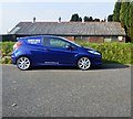 Car parked in front of shed, St Mellion